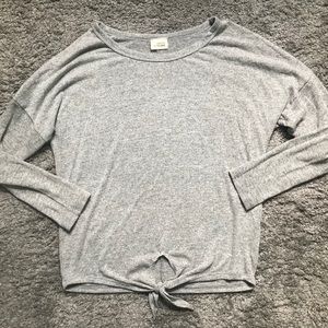 • Caution to the Wind Top •